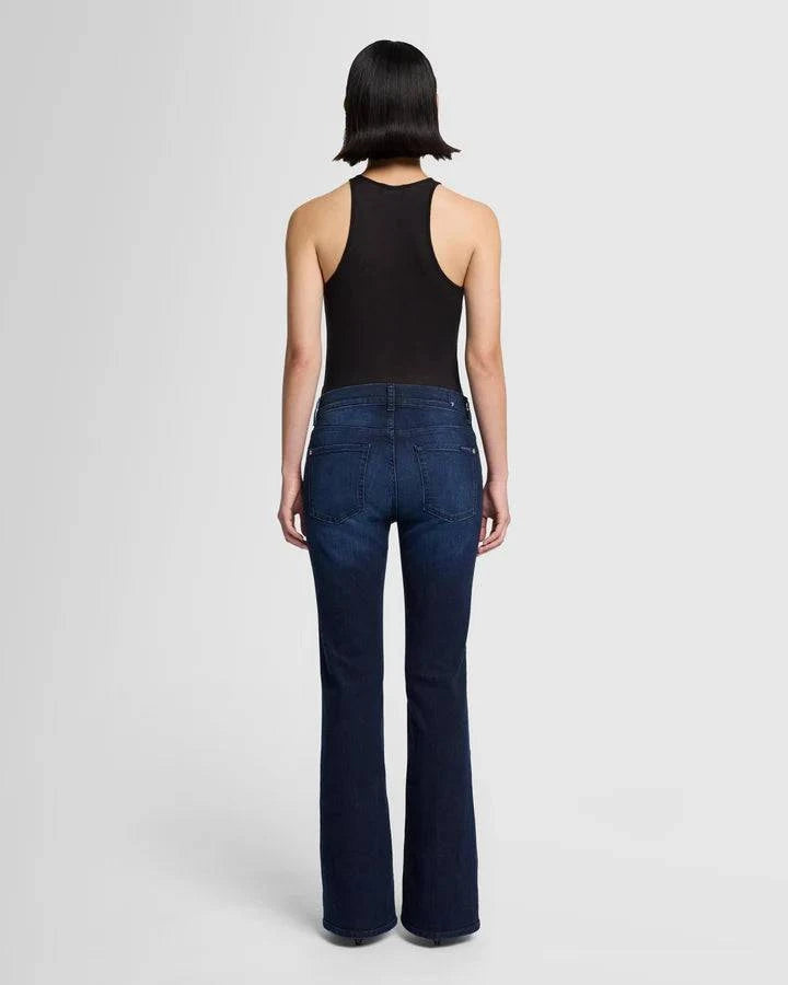 Back view of 7 for All Mankind Bootcut Tailorless Jeans in inky blue wash, showcasing the mid-rise fit and subtle stretch, available at Lemonberry in Aurora, ON.