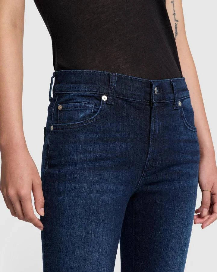 Close-up of the waist of 7 for All Mankind Bootcut Tailorless Jeans in inky blue wash, showcasing the mid-rise fit and premium denim, available at Lemonberry in Aurora, ON.