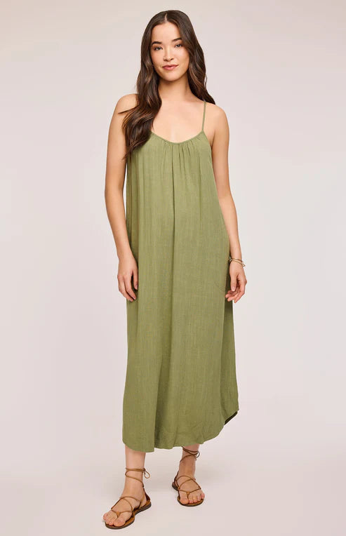 A llight linen dress, with a breezy silhouette, ideal for spring outings in Richmond Hill and beyond.