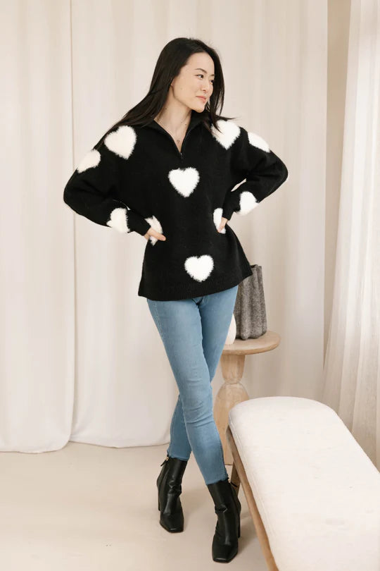 The Galentine's Day Sweater in black and white, featuring a cozy, festive design perfect for celebrating with friends. Relaxed fit and soft fabric for comfort.