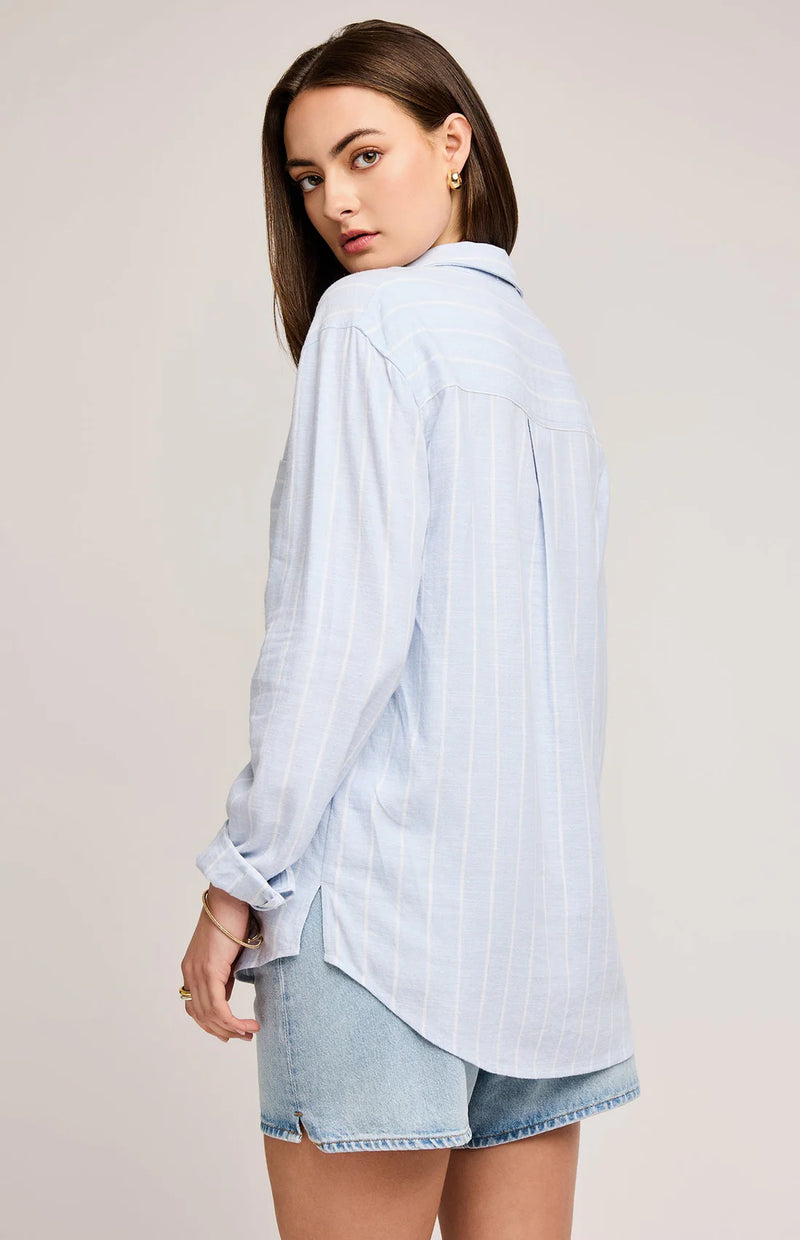 Back of model wearing the Portia button down shirt in sky stripe by Gentle Fawn, is available across Canada at Lemonberry.ca with free shipping on orders over $150!