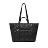 Front view of the Brenda Tote by Pixie Mood, showcasing its quilted, water-resistant design made from eco-friendly recycled nylon.
