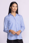 Front view of Dorit Top by Pink Martini in blue, buttoned-up, showcasing the striped design.