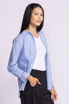 Side view of Dorit Top by Pink Martini in blue, unbuttoned, highlighting the striped pattern.