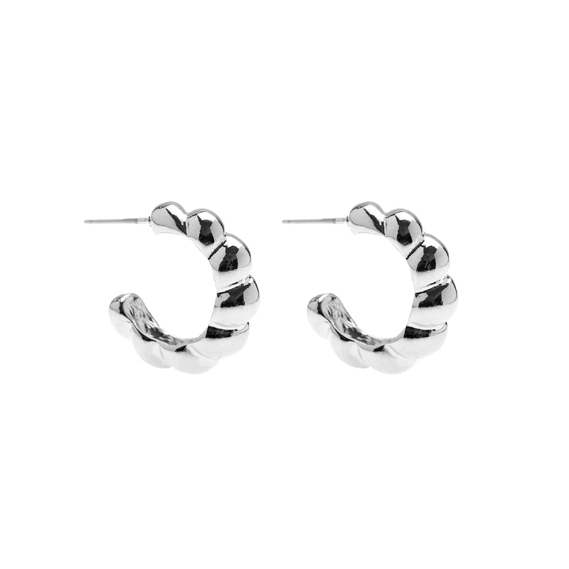 The Croissant Earrings in Silver by Foxy Originals, displayed on a white background. Handmade in Canada, lead-free, and plated in high-quality silver.