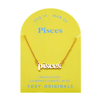 Foxy Originals Pisces Zodiac Necklace on its display card, featuring a gold script-style pendant with stylish packaging.