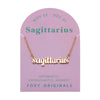 Foxy Originals Sagittarius Zodiac Necklace on its display card, featuring a gold script-style pendant with stylish packaging.