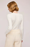 Back view of the Mia Top in White, showcasing the slim fit and functional button closure.