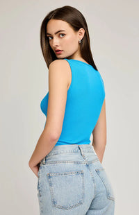 Back view of the Nala Tank in Capri color, showcasing the ribbed fabric and form-fitting design.