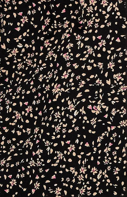 Close-up of the fabric of the Gentle Fawn Sutton Dress, featuring the unique in-house designed print and smooth texture.