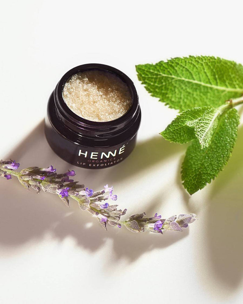 Lavender Mint Lip Exfoliator opened to display its smooth, minty formula with a hint of lavender fragrance.