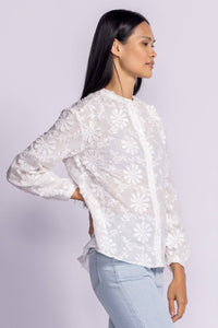 Side view of the Katherine Top, white embroidered blouse by Pink Martini, showcasing its elegant design, available at Lemonberry, Aurora, ON.