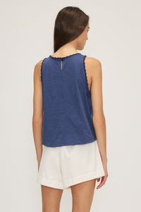 Back view of the Kelsi Satin Mixed Media Sleeveless Top in blue, featuring soft cotton fabric.