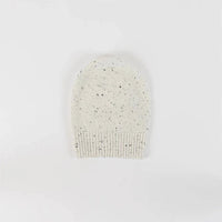 White Lyla & Luxe Beanie on white background, a soft and stylish cold-weather accessory.