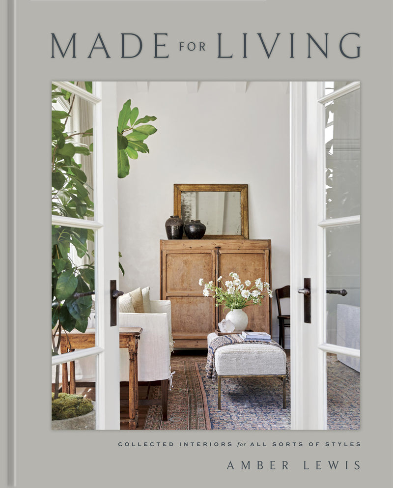 Cover of "Made for Living" by Amber Lewis, featuring a beautifully designed interior with warm, layered textures and a cozy, inviting atmosphere.