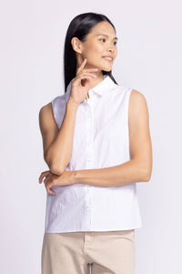 White front view of the Pink Martini Lisa Sleeveless Top, offering a sleek and versatile design perfect for any occasion.