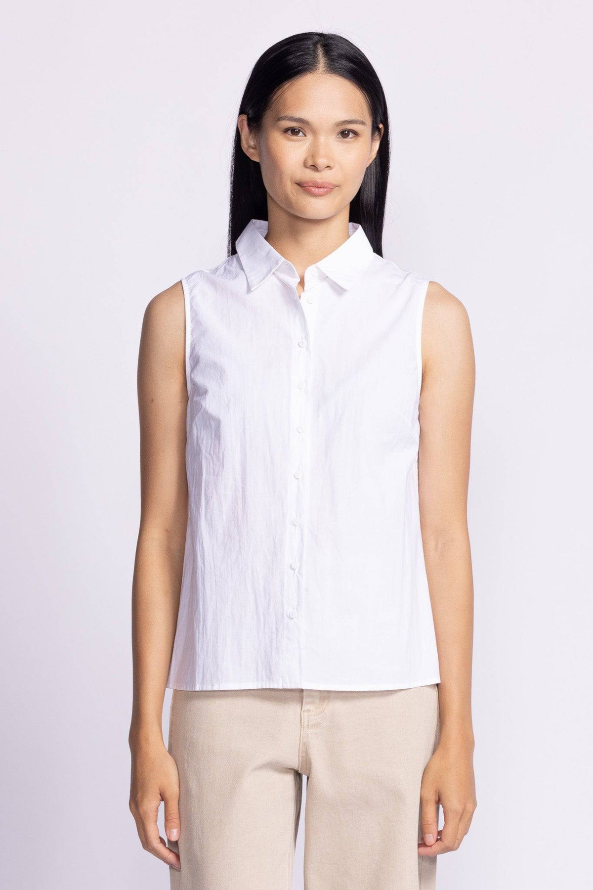 White front view of the Pink Martini Lisa Sleeveless Top, a versatile and stylish wardrobe essential.