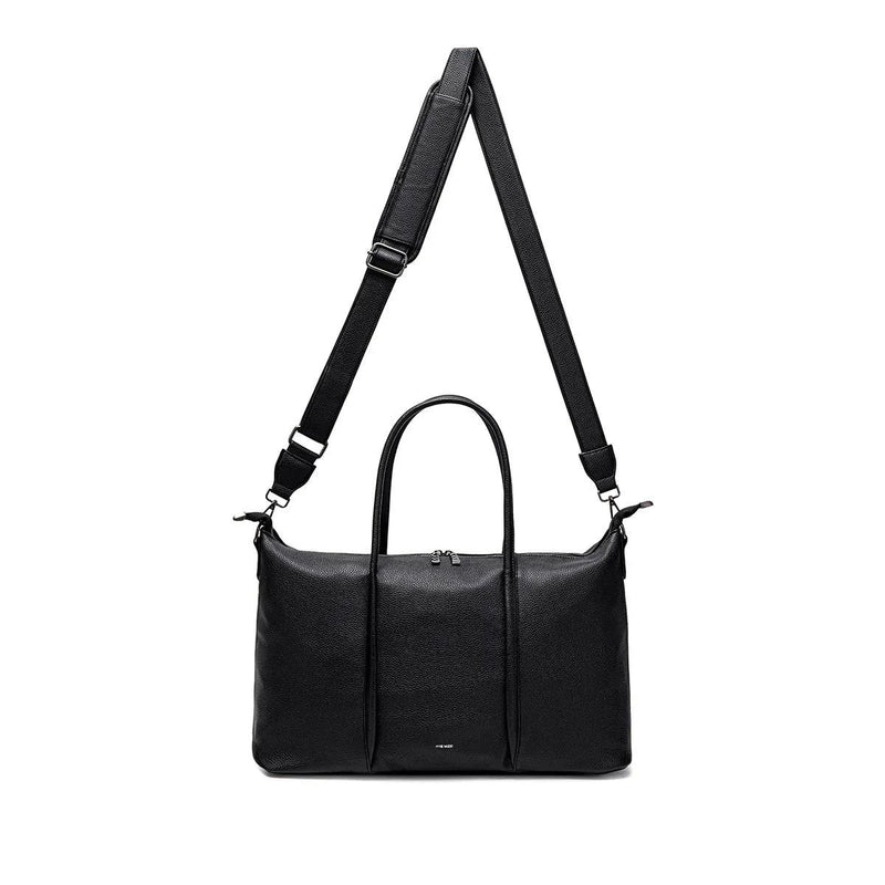 Pixie Mood Amara Weekender with its adjustable shoulder strap extended, offering versatile carrying options.