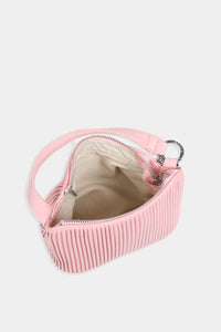  Interior of Ella Crossbody in pink by Pixie Mood, showing spacious compartment and zip pocket for organization.