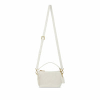 Ella Crossbody in white by Pixie Mood, displayed hanging with shoulder strap for versatile wear.