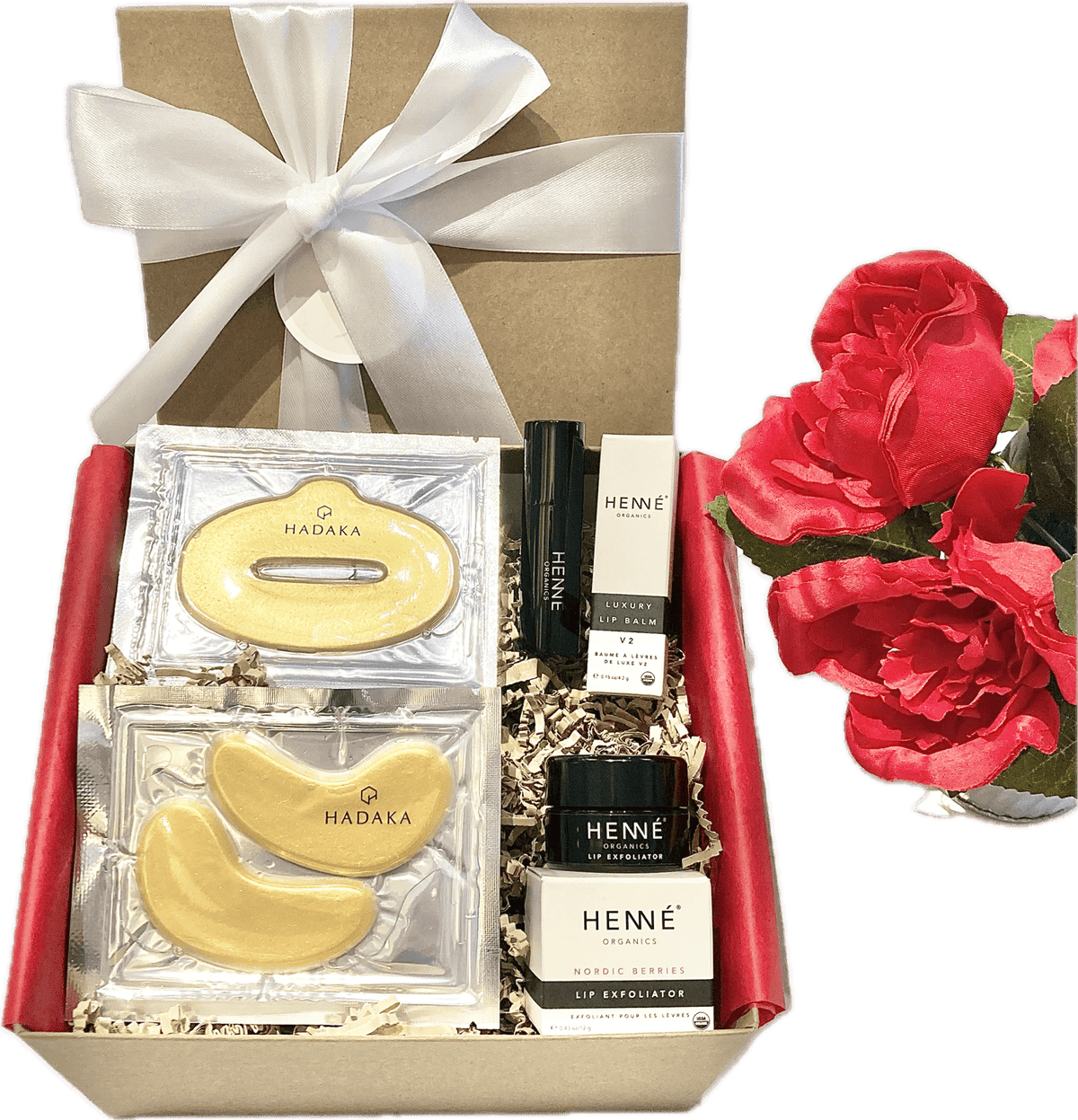 Valentine’s Gift Box #3 featuring Hadaka Eye & Lip Mask, Henné Luxury Lip Balm, Henné Lip Exfoliator, and a beautifully wrapped gift box with tissue and ribbon.