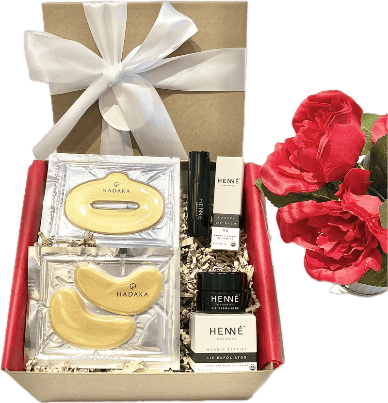 Valentine’s Gift Box #3 featuring Hadaka Eye & Lip Mask, Henné Luxury Lip Balm, Henné Lip Exfoliator, and a beautifully wrapped gift box with tissue and ribbon.