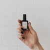 Bkind Nail Polish in a sleek black bottle, providing a chic and durable finish.